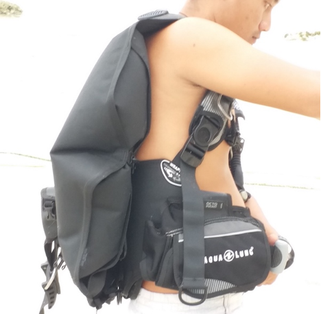 Back Inflation BCD - notice the air bladder in the back and relatively clean chest area, with only straps and pockets.