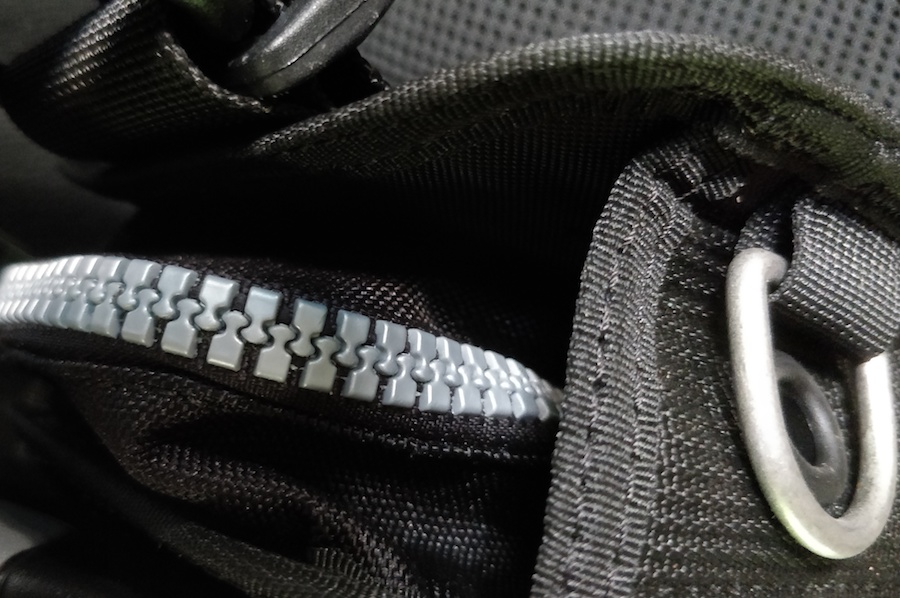 High quality zippers, sturdy hardware and quality stitching on display